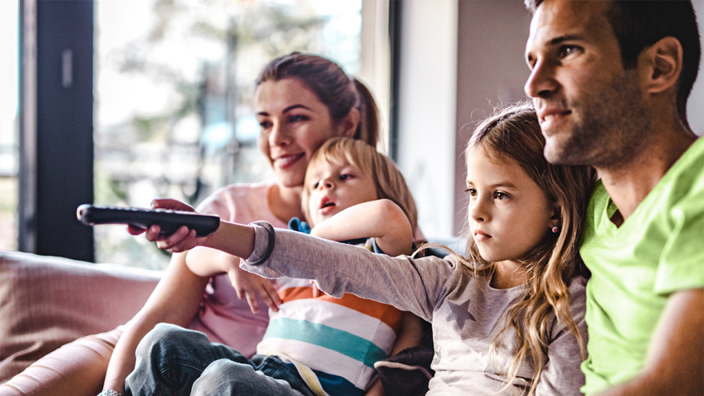 Young family watching TV